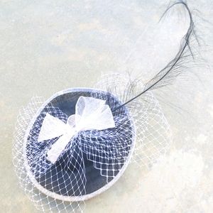 Black and white scala fascinator hat